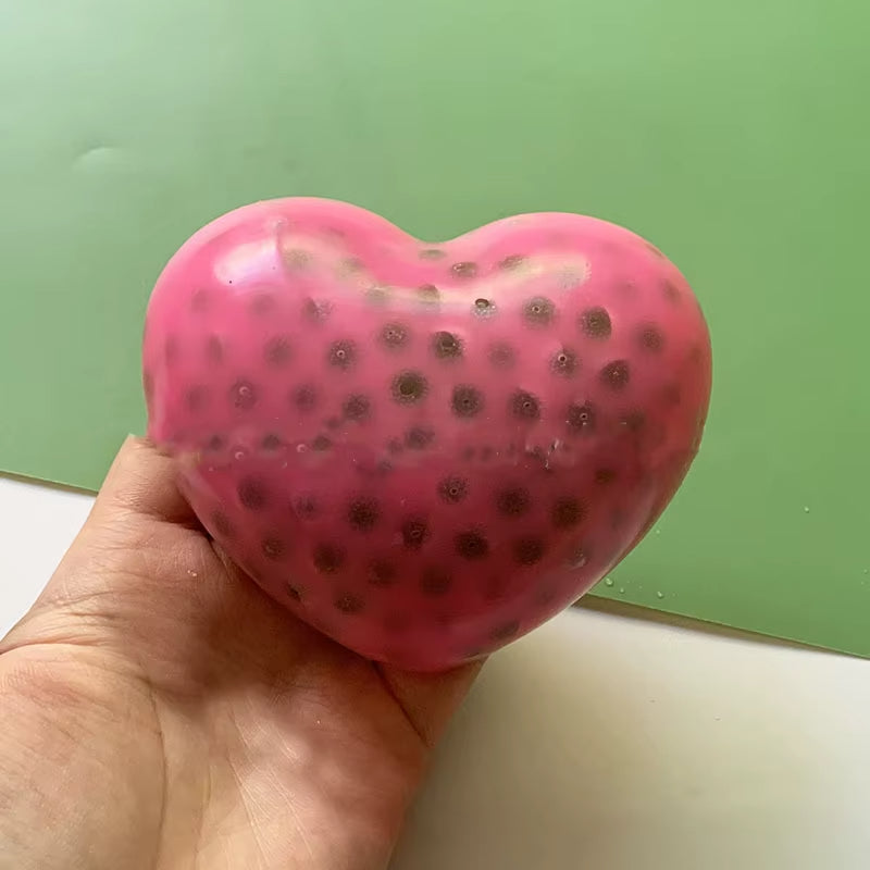 Squeeze pimple heart